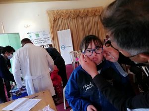 Trying on glasses on a girl Trying on glasses on a girl